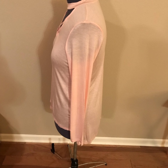 Mock neck, keyhole, crisscross long sleeve top. - Picture 4 of 5